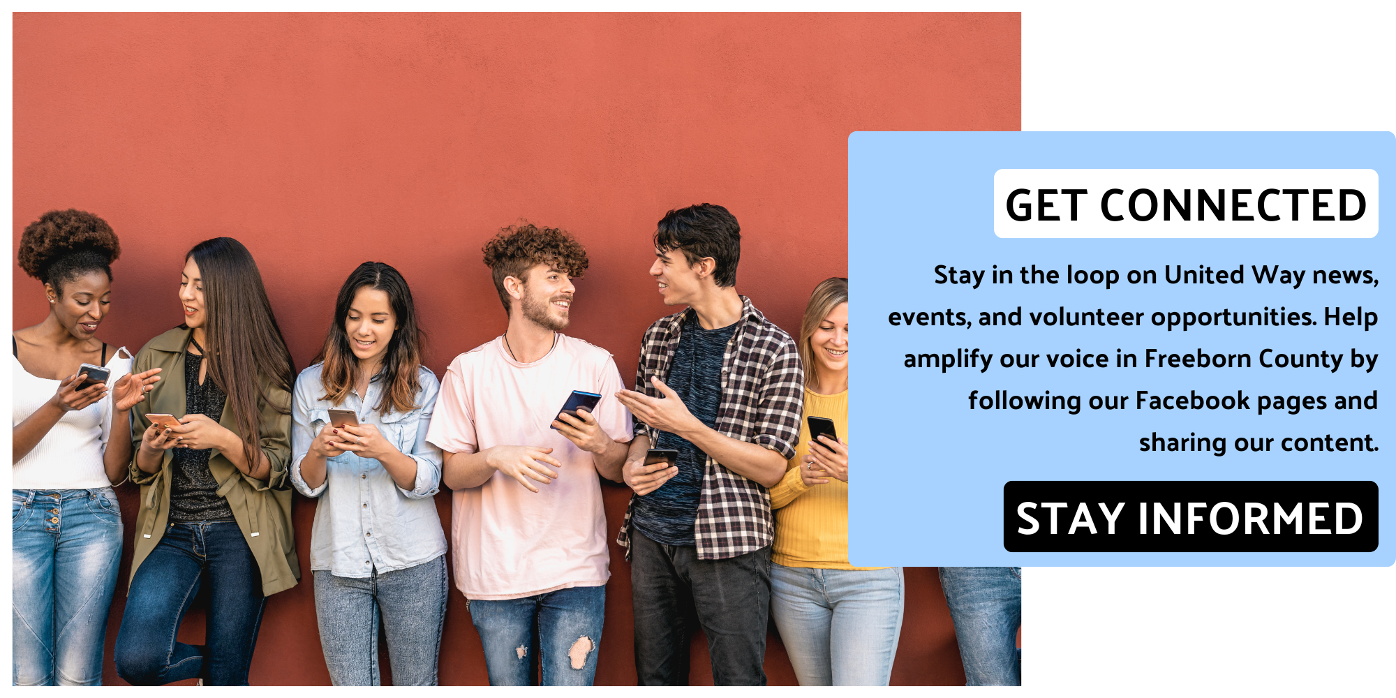 Young people in front of a red wall looking at their cell phones